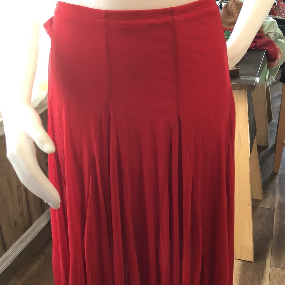 Moa-Moa RED XL and true to size.Sheer half slipped. I had Above knee slip.